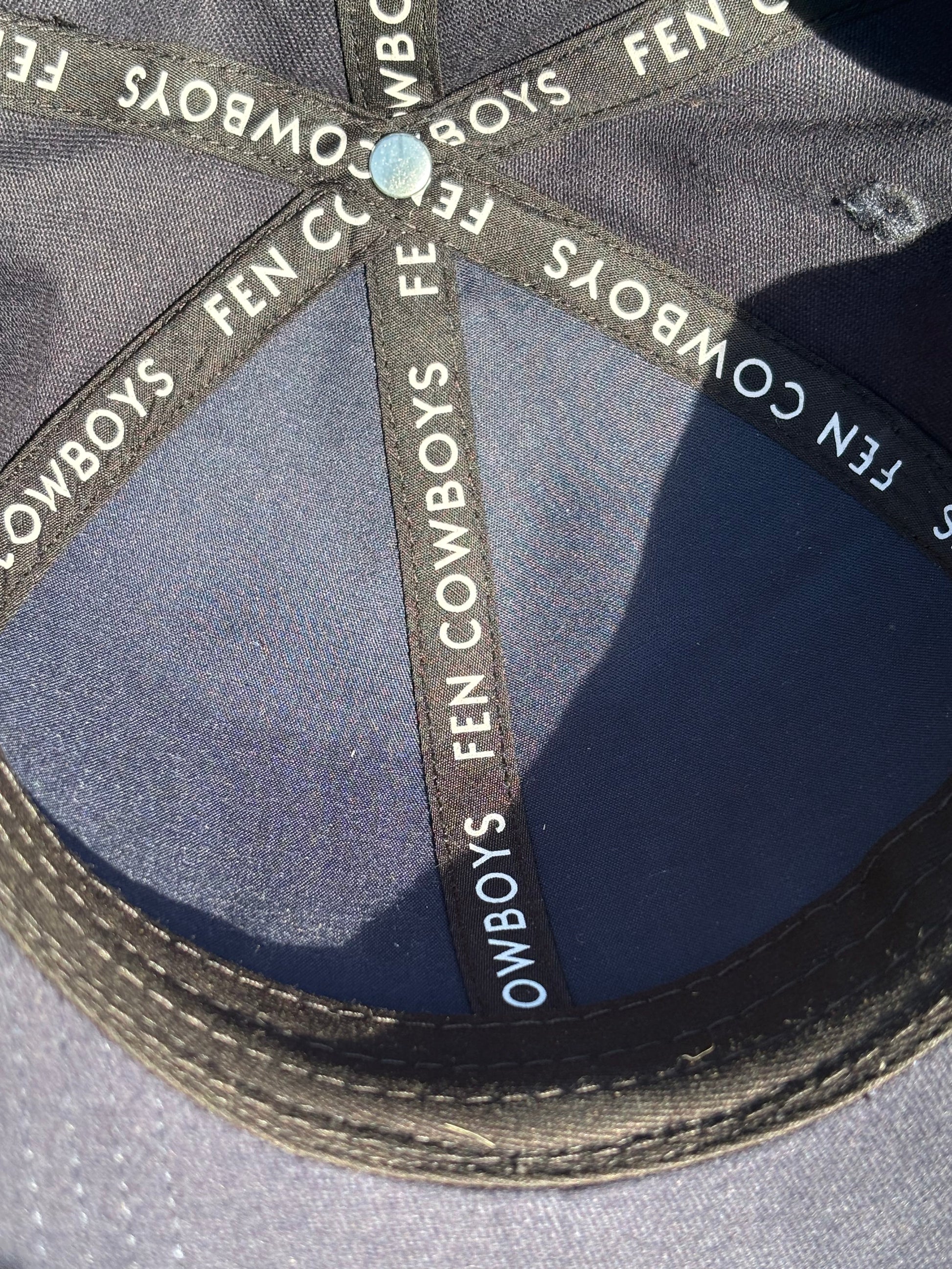 Inside of baseball cap Fen Cowboys
